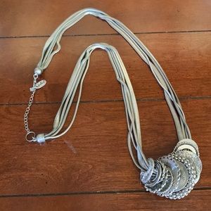 Multi strand long silver necklace with pendant beads